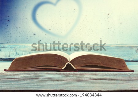 retro photo of book and heart mark