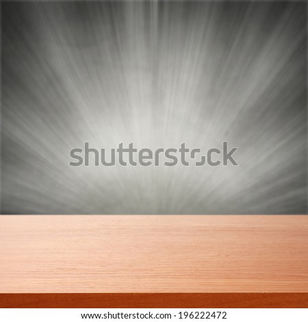 red desk of free space and gray wall with light
