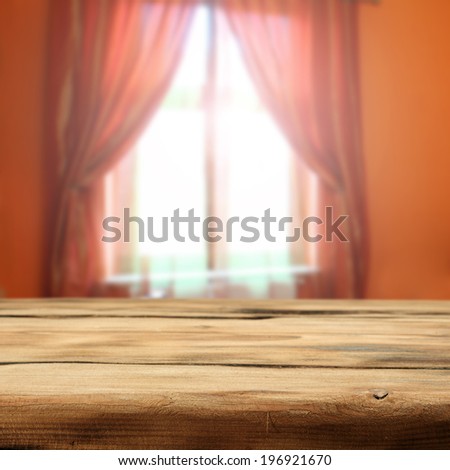 window light in interior space with desk of wood