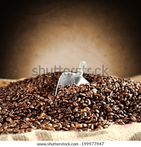 cafe and coffee beans with spoon of metal