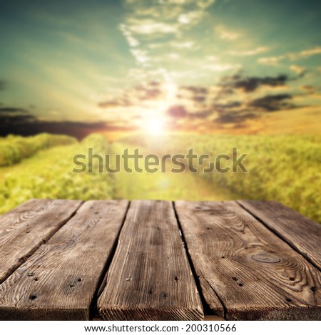 old worn wooden table of free space and summer sky