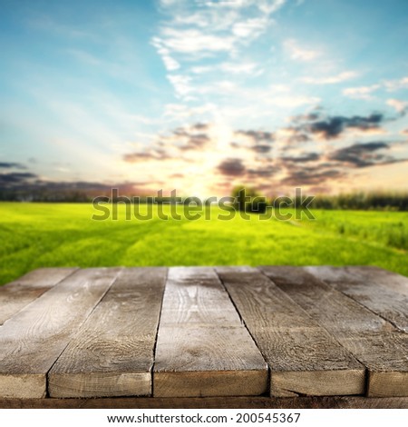 empty rural table and country sky of sun