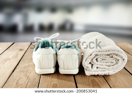 shoes of white white towel and fitness club