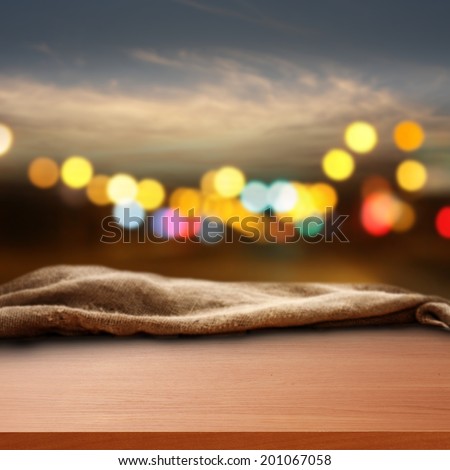 table with soft decoration and lights in night