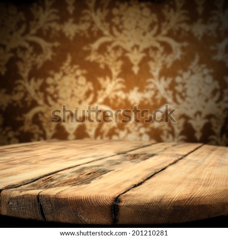 wooden table and wallpaper space of free
