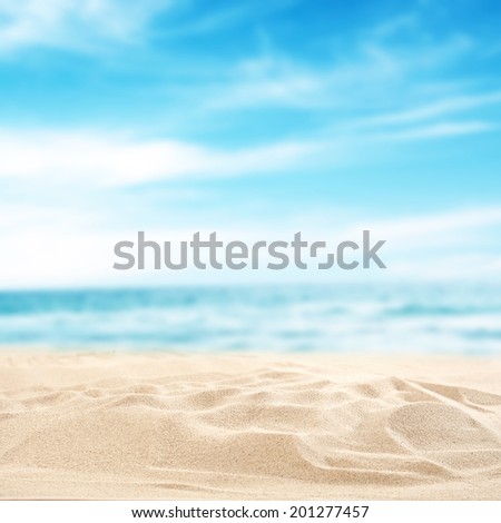 blue sea and sand with sun light