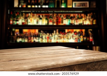 wooden table and bar space