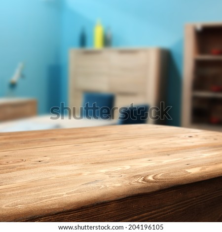 wooden table and blue wall