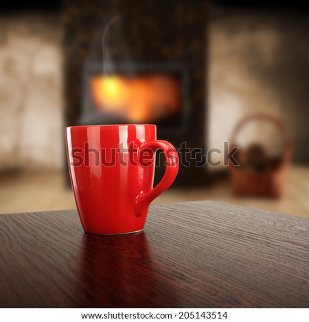 fireplace red mug smoke and desk of wood