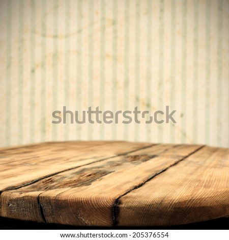 worn table and wallpaper
