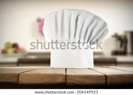 white cook hat and kitchen background space in home