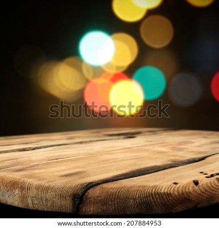 worn table and night space