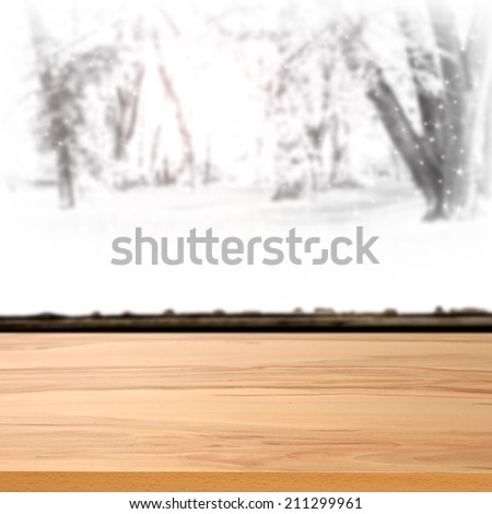 yellow desk of window sill and winter