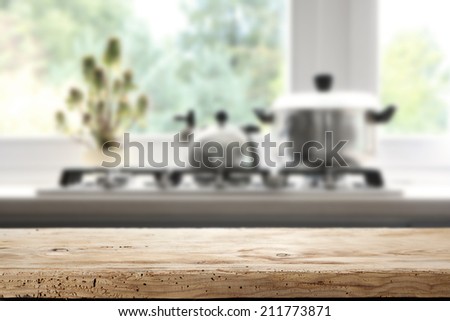 desk of wood in kitchen with window