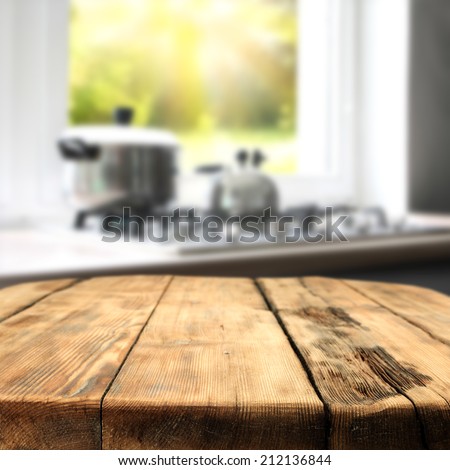 table of kitchen with window and kitchen furniture
