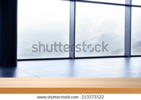 desk of wood and window with fog