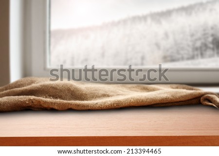 sill of wood and window space