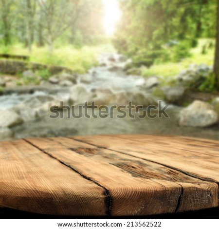 river and table of wood space