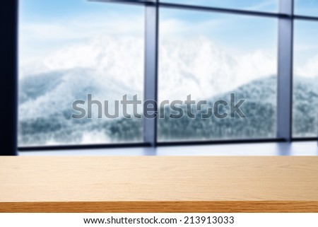 window in hotel and yellow desk space
