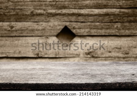 gray wooden wall space and brown wall of wood