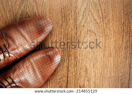 brown retro shoes and old floor of wood