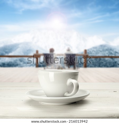 warm coffee cup and winter space of mountain