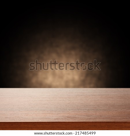 dark wall of brown and desk of brown color