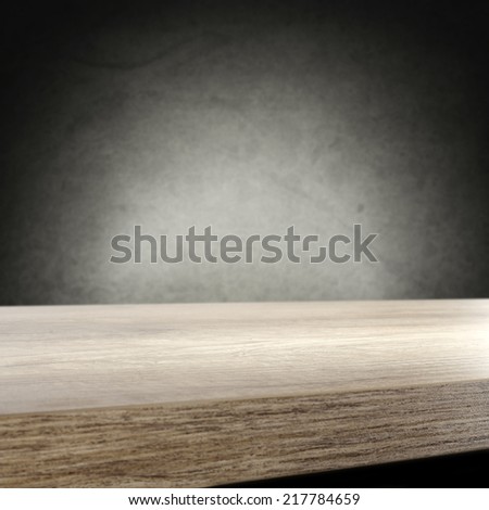 wooden top space and dark gray wall with shadow space