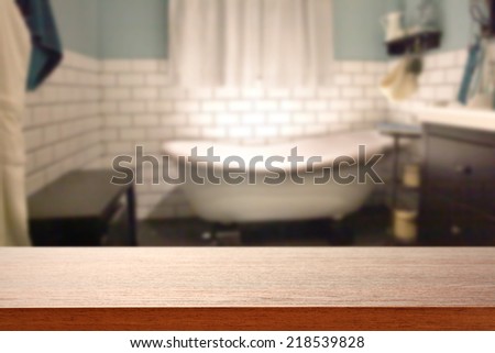 dark brown desk and bathroom