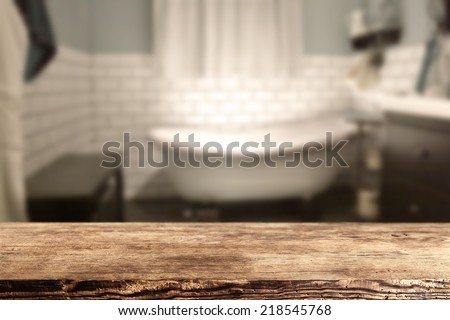 dark desk of free space and white bath in bathroom