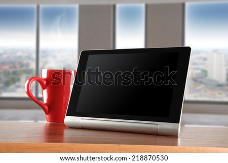 window in office and table with mug