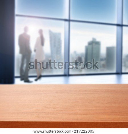 big window in office and desk space