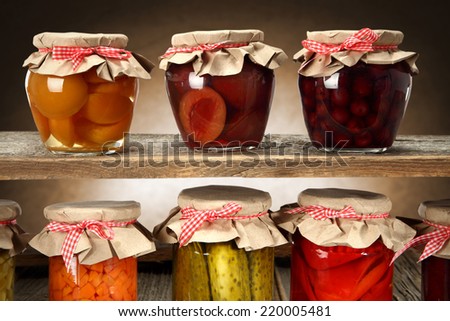 jars on wooden shelf
