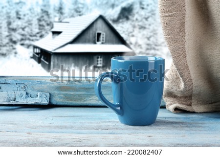 blue mug and window