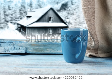 blue window and blue mug