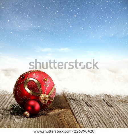 winter holiday sky of blue and red ball