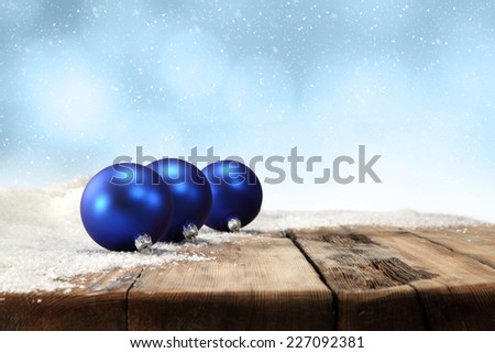 dirty old retro wooden table and blue balls