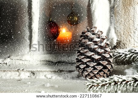 cone and tree of snow and window sill of snow