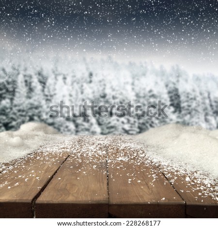 wooden old table and snow