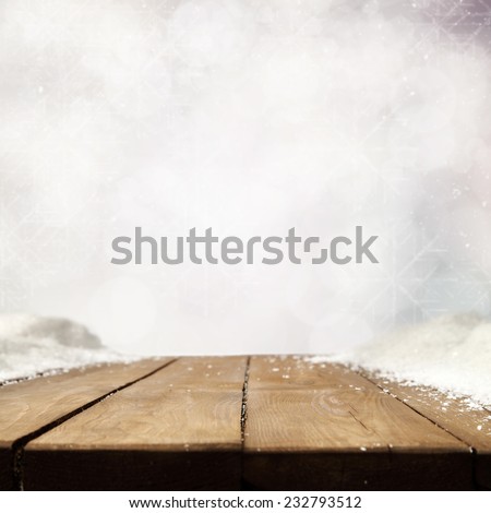 free space on brown wooden table and snow space for you