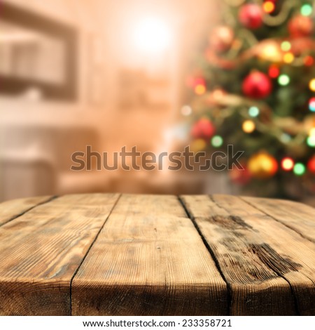 worn old table of wood and xmas tree space