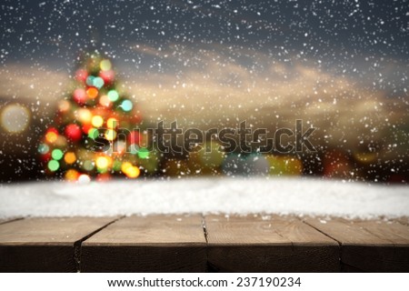 table of wood and xmas time in night