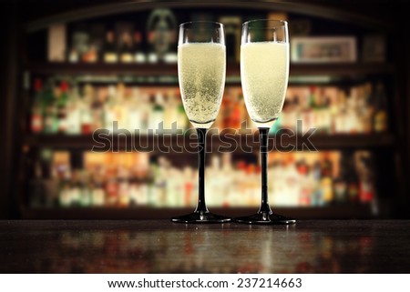 champagne glasses on bar