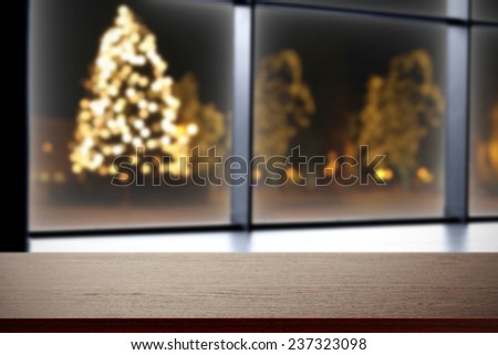 big window with christmas tree space and dark top of free space