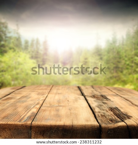 decoration of empty table and spring landscape of forest