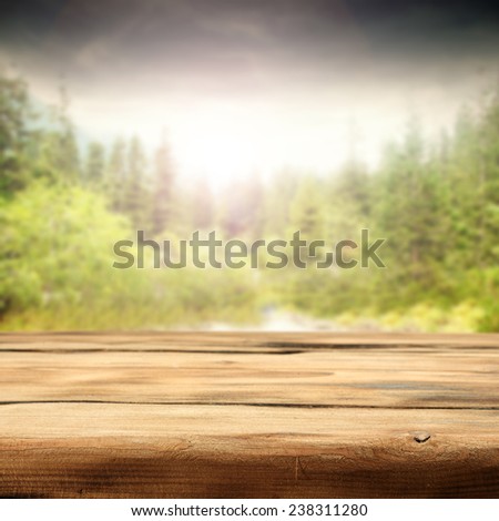decoration of empty table and forest landscape