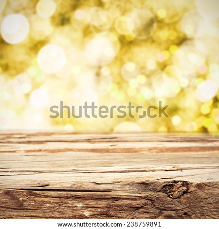 sunny background of spring bokeh and worn old table