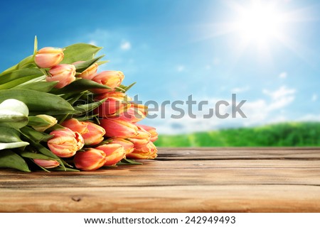 flowers on desk of tulips