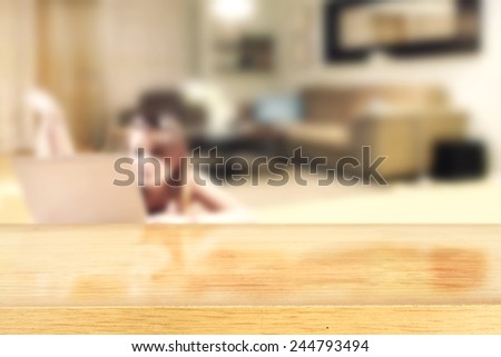 yellow desk in home and girl with laptop