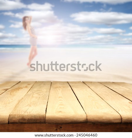 yellow sand on beach sky with sea and wooden old table